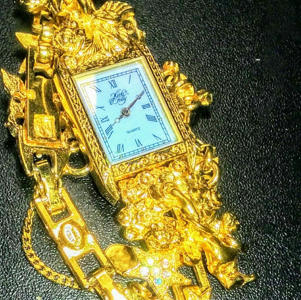 Kirks Folly "Secret Of 7 Angels" Womens Gold Watch